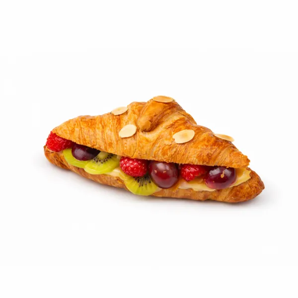 Сroissant z konfiturą brzoskwiniową i owocami